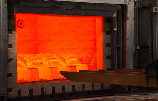 engineer inspecting a precision industrial casting before dispatch